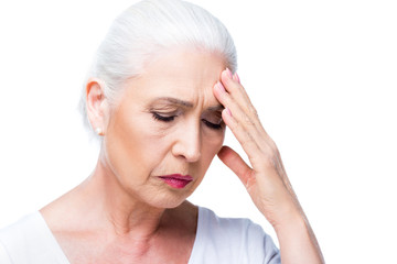 Canvas Print - tired senior woman with headache