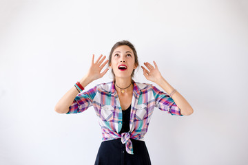 Wall Mural - Portrait of a smiling wide young woman