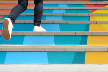 Lower Part Of Teenage Girl In Casual Shoe Walking Up Outdoor Colorful Stair,teenage Lifestyle Successful Concept