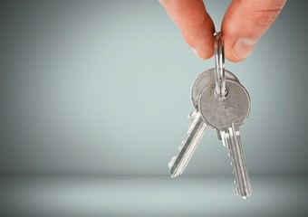 Poster - Hand Holding key in front of vignette