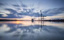 Southampton Docks Viewed From Marchwood At Sunset.