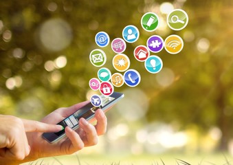 Poster - hand with phone with application icons coming up from it. Green