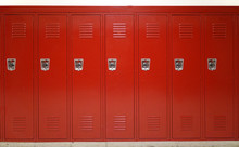 Close Up On Red Lockers In Gym