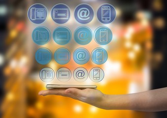 Poster - hand with phone with application blue icons panel over. Blurred