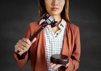 Sticker - Female judge with gavel against grey wall