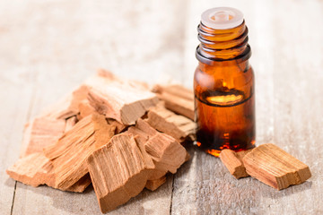 Sticker - Sandalwood essential oil on the table