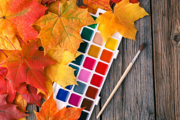 Wall Mural - art workplace in fall maple leaves.