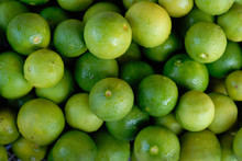 Green Lemon Stack Closeup For Background