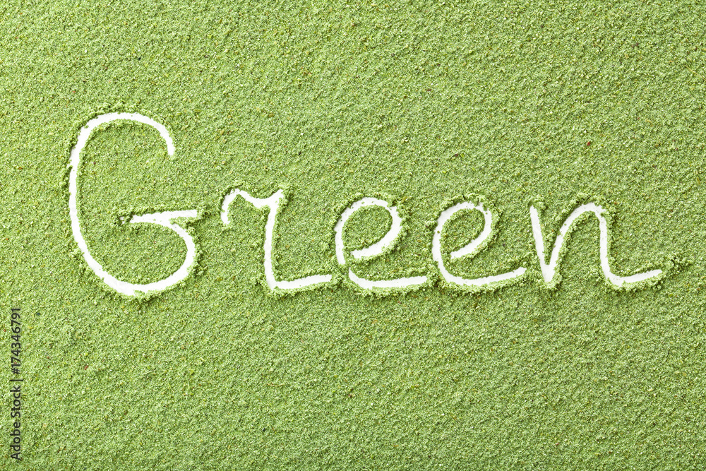 Word GREEN made from wheat grass powder