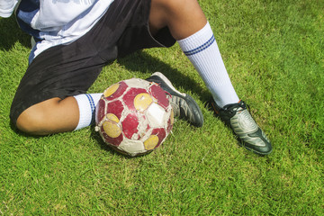 Poster - child playing soccer