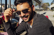 © Marko Milanovic/Stocksy - Young cool guy in bar