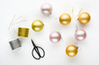 © Pixel Stories/Stocksy - Cutting bauble hangers