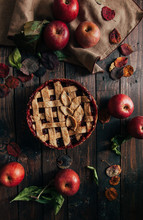 Rustic Apple Pie On Wooden Table