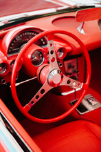 Red Steering Wheel And Interior Of Classic American Car