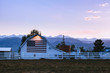 © Casey Mac Photo/Stocksy - American flag barn, Colorado, USA