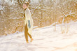 © Julia - Cute fashion Girl barefoot on white cold snow in winter. Quenching tempering harding health concept. Female feet without shoes. Healthy and Strong organism