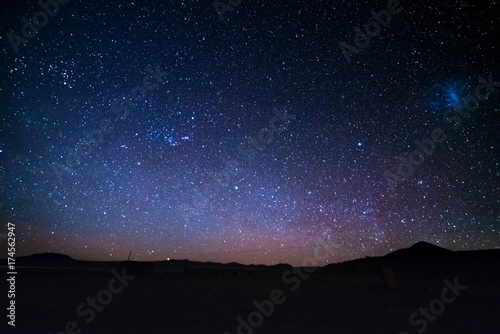 The majestic Magellanic Clouds, outstandingly bright, captured from the Andea highlands in Bolivia, South America.