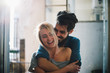 © Nemanja Glumac/Stocksy - Pretty Blond Woman Smiling While Her Boyfriend is Hugging Her.
