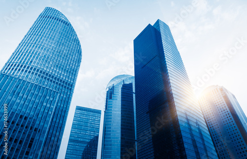 directly below of modern financial skyscrapers in central Hong Kong,blue toned,china Canvas Print