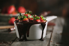 Preparing Chocolate Covered Strawberries