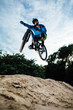 © Brian Powell/Stocksy - mountain bike pro jump