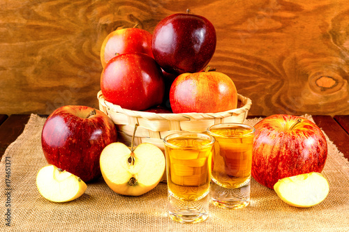 Plagát Schnapps drinks and apples in the wicker basket