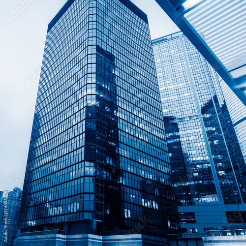 directly below of modern financial skyscrapers in central Hong Kong,blue toned,china Canvas Print