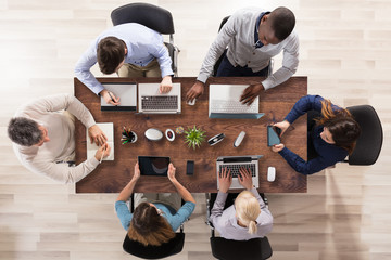 Wall Mural - Group Of Businesspeople Working In Office