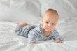 © arttim - Portrait of a child four months on bed