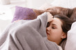 © Photodrive - Young beautiful sleepy-head woman waking up in the morning. Past dreams, calmness and relaxation, staying in bed for a while, close up picture