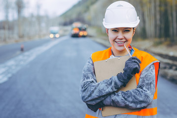 female worker road construction