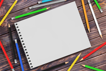Fototapete - Top View of White Spiral Paper Cover Art Book with Multicolour Pencils. 3d Rendering