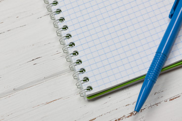Fototapete - Blank Notebook with Pen on Vintage Rustic Wooden Table Background