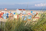 Fototapeta  - Auszeit, Entspannung, Ruhe, Urlaub in Deutschland: Strandkörbe, Dünengras, Sandstrand und Meer auf Langeoog :)