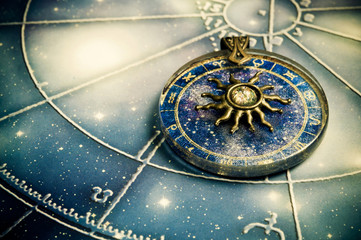 zodiac ring with astrology symbols and sun over a horoscope like a concept of sun astrology