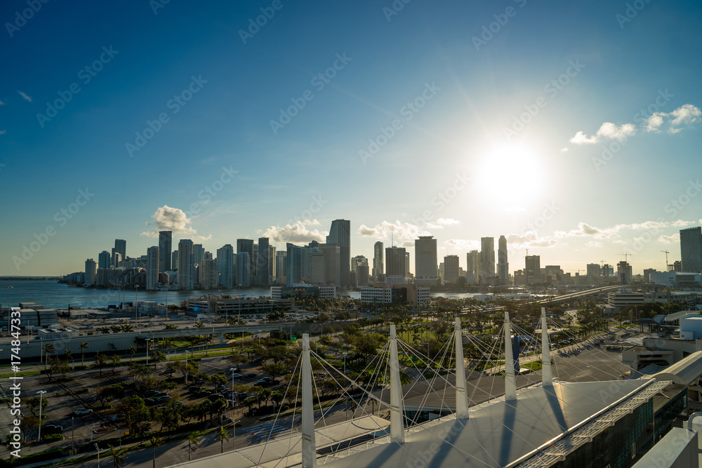 Miami Skyline and shipping docks from cruise ship with cruise ship board foreground - obrazy, fototapety, plakaty 