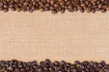 Coffee bean.Dark and medium roasted coffee bean on burlap background.