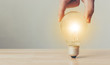 Hand holding light bulbs, Concept new ideas for your business or thinking creativity, Copy space