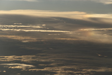 Wall Mural - Sunset White Cloud sky at high level attitude, view from window airplane