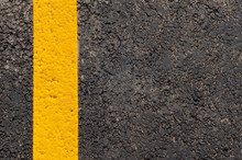 Yellow Line On The Road Texture Background