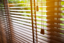 Wooden Blinds With Sun Light.