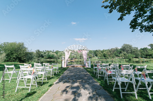 Beautiful Summer Wedding Ceremony Outdoors Decorated Chairs