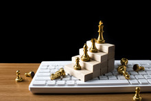 Gold Chess With Wood Stair On White Keyboard In Business Vision Concept