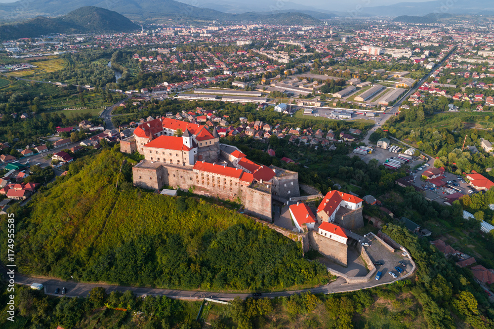 Aerial view of Palanok Castle, located on a hill in Mukacheve, Ukraine - obrazy, fototapety, plakaty 