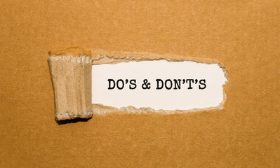 Poster - The text DOS AND DONTS appearing behind torn brown paper