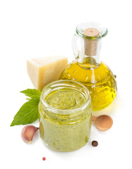 Canvas Print - pesto sauce in jar on white background