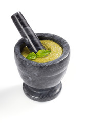 Canvas Print - pesto sauce in mortar on white