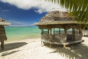 Wall Mural - samoan fale bungalow at the beach in samoa savaii lano beach