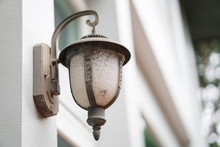 Old Outdoor Wall Lamp Light On White Exterior