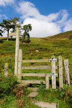 Trail Sign Post And Stile On A Rural Trail In The United Kingdom